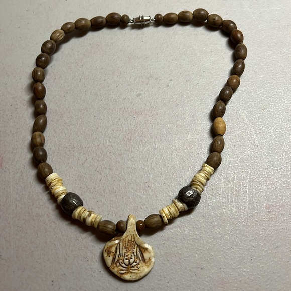 Handcrafted wood and stone bead necklace with carved pendant - Picture 4 of 5